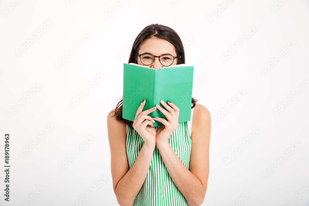 Portrait of a smiling girl in dress and eyeglasses Portrait of a smiling girl in dress and eyeglasses