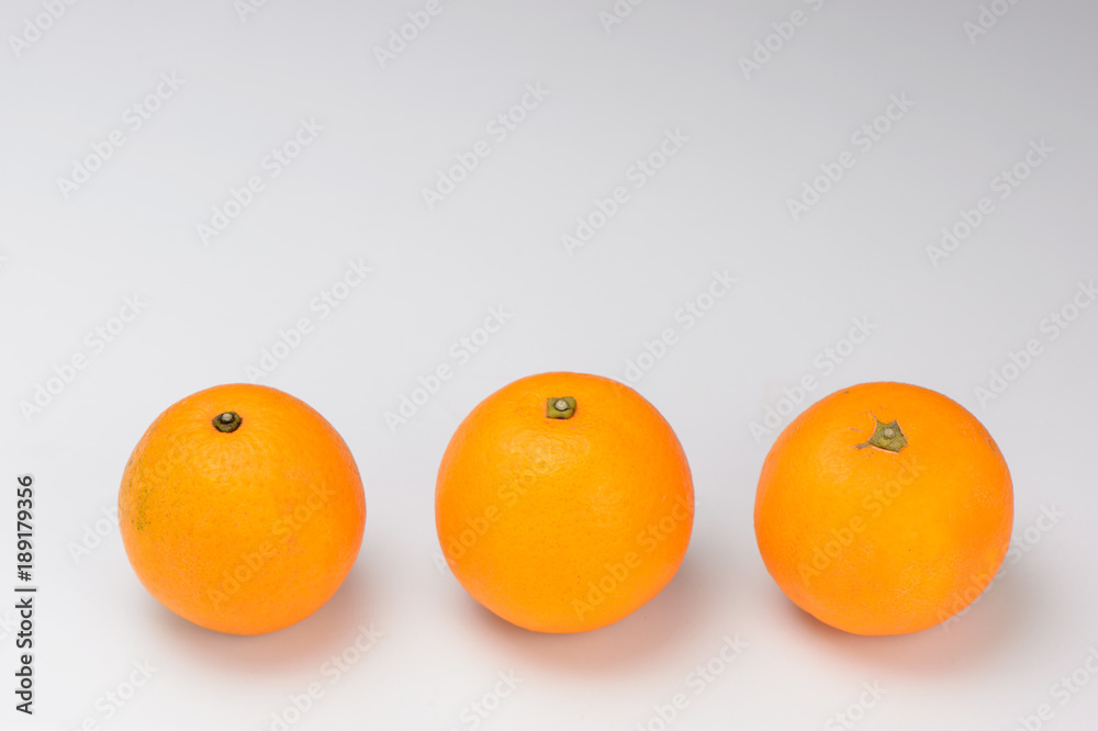 fresh oranges isolated on white background
fresh oranges isolated on white background