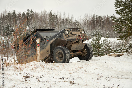 Russian Off-road car on winter landscape