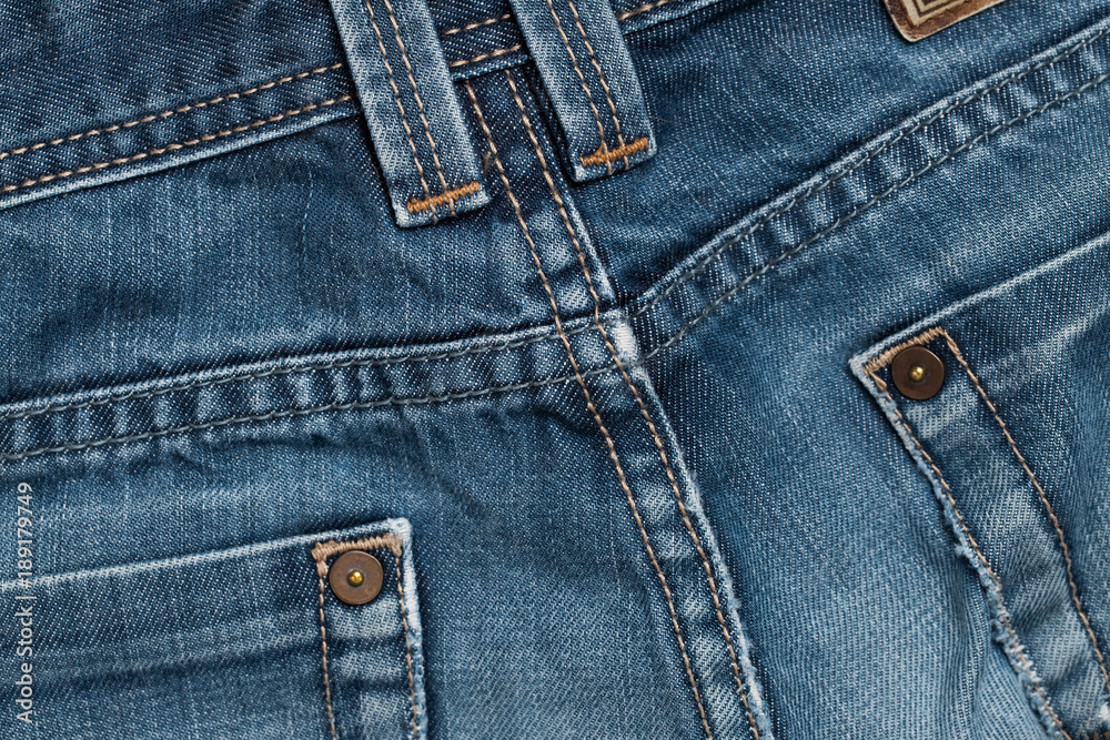 Blue Pants Old Jeans Textured Background With Stitches. Blue Pants Old Jeans Textured Background With Stitches.