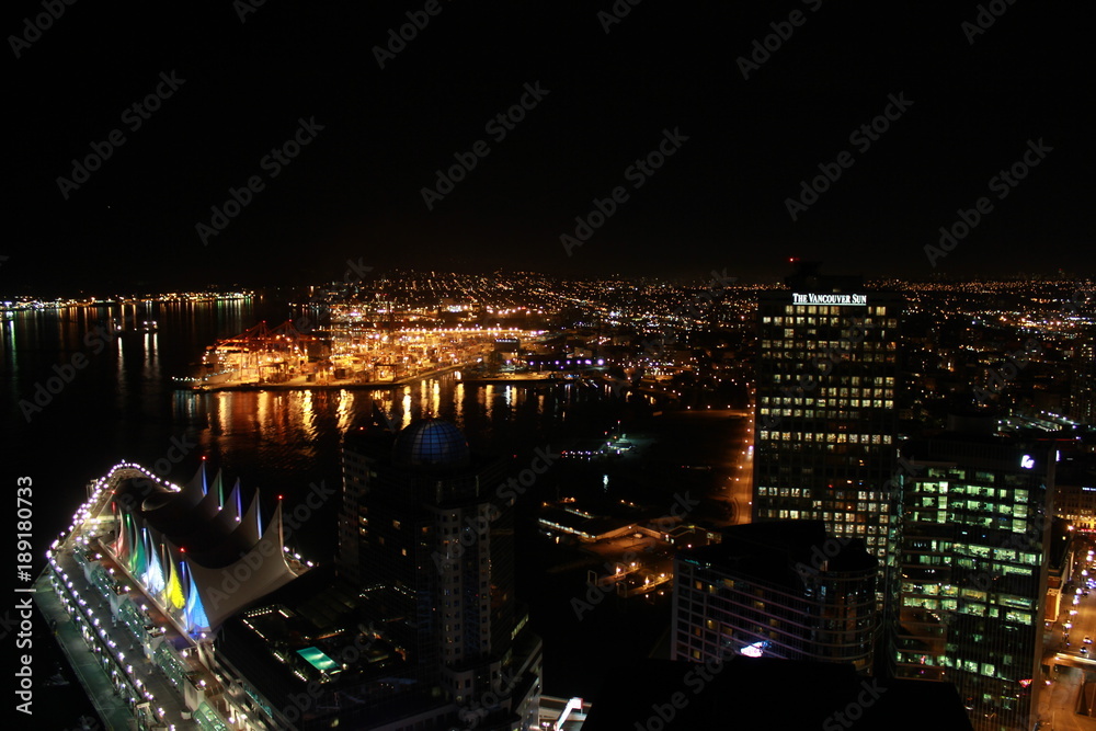 Fototapeta premium View over Vancouver harbour and downtown at night.