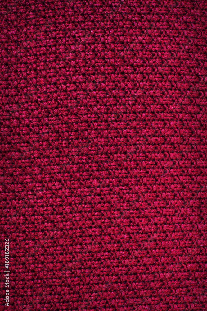 Red fabric. Knitting. Background of fabric. Close-up. Texture Red fabric. Knitting. Background of fabric. Close-up. Texture