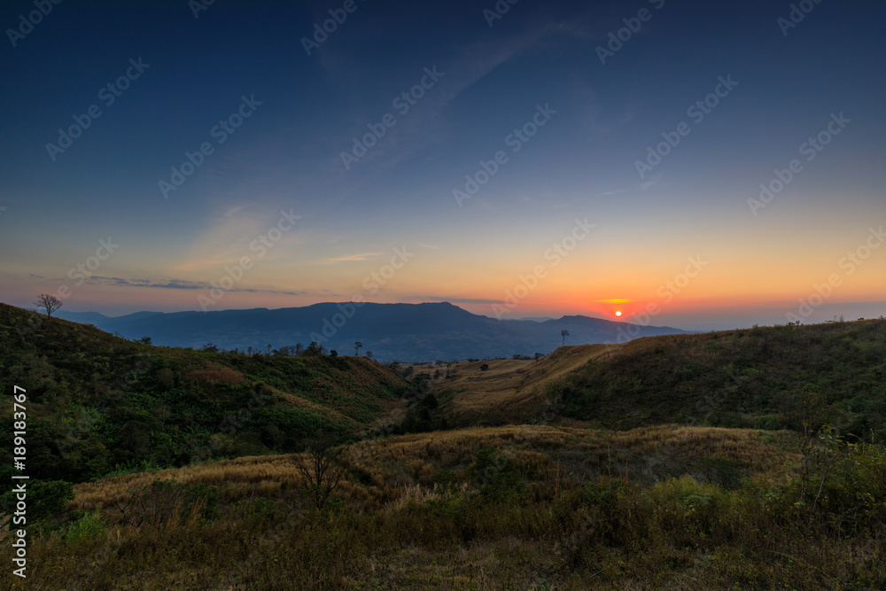Beautiful sunset on the high mountain in Loei province, Thailand.