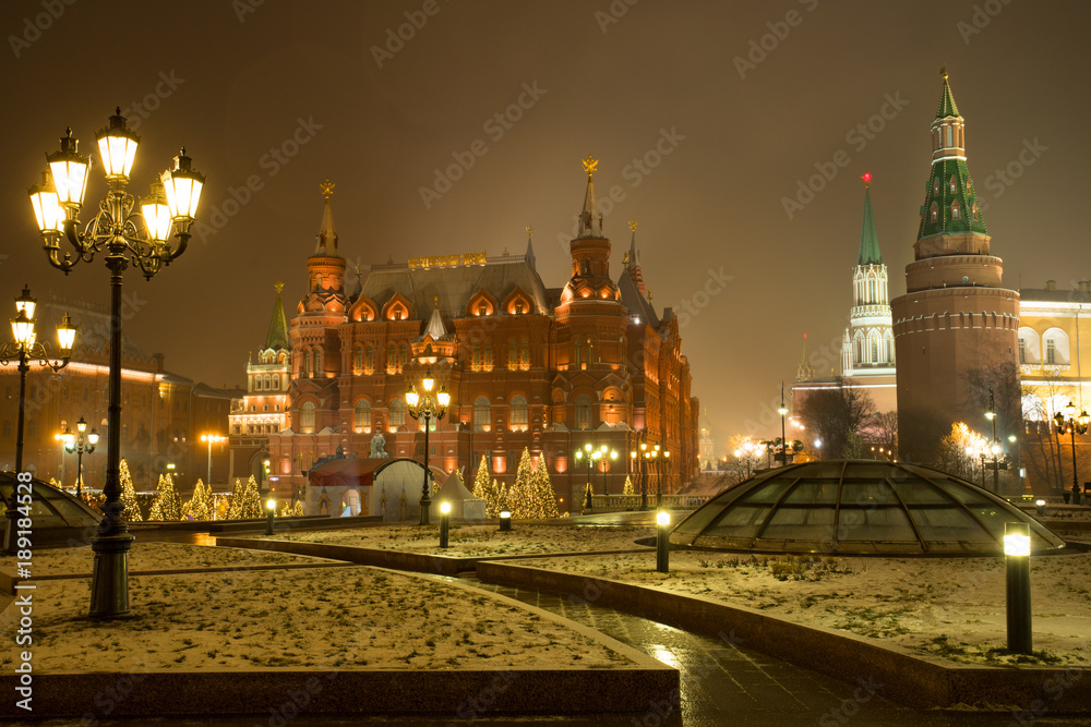 Moscow, Russia. State Historical Museum And Moscow Kremlin On Manege Square With Light Lamps In Evening Time Winter.