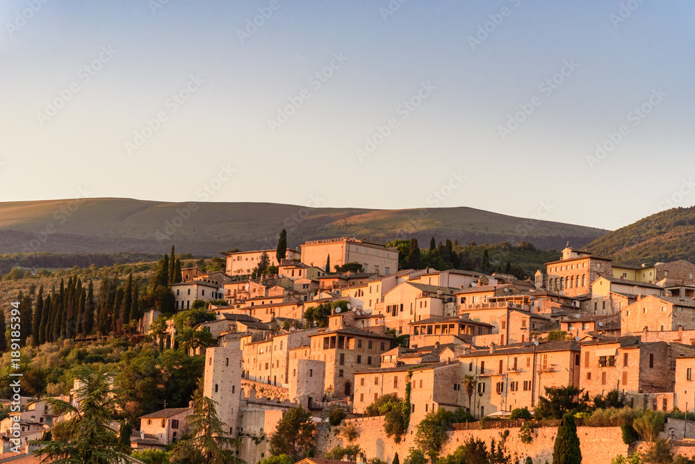 View of the medieval town of Spello in Umbria, Italy at sunset
