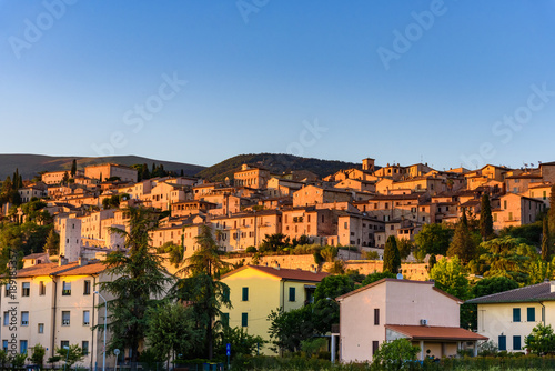 View of the medieval town of Spello in Umbria, Italy at sunset