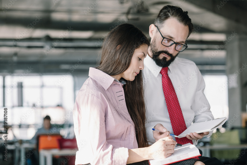Team lead and female manager discussing agreement condition. Business concept. Team lead and female manager discussing agreement condition. Business concept.