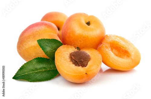 Fresh apricots in section with green leaves still life of ripe