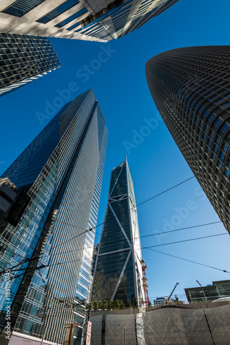 Dramatic and interesting angle of San Francisco s skyscrapers and high-rise office buildings       