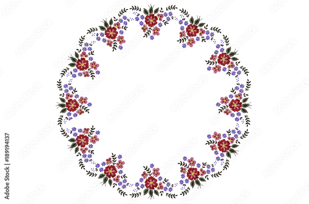 Round pattern for napkin embroidery with bouquet of red and purple flowers and leaves on white background
