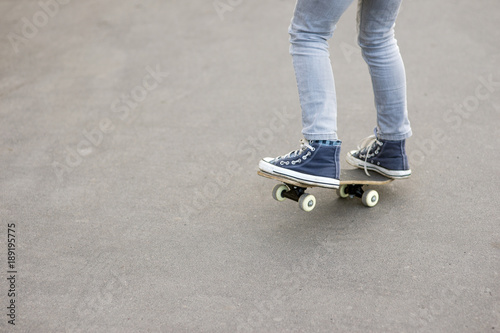 skateboard legs asphalt