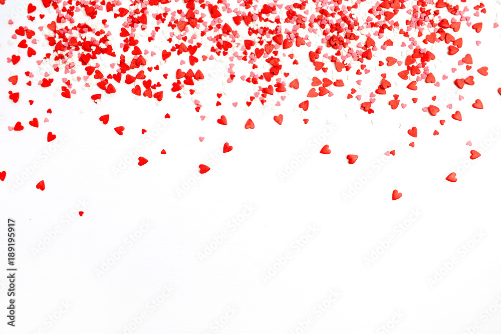 Valentine's Day background. Flat lay, top view of red, pink and white hearts. Blog header or hero. Love concept.