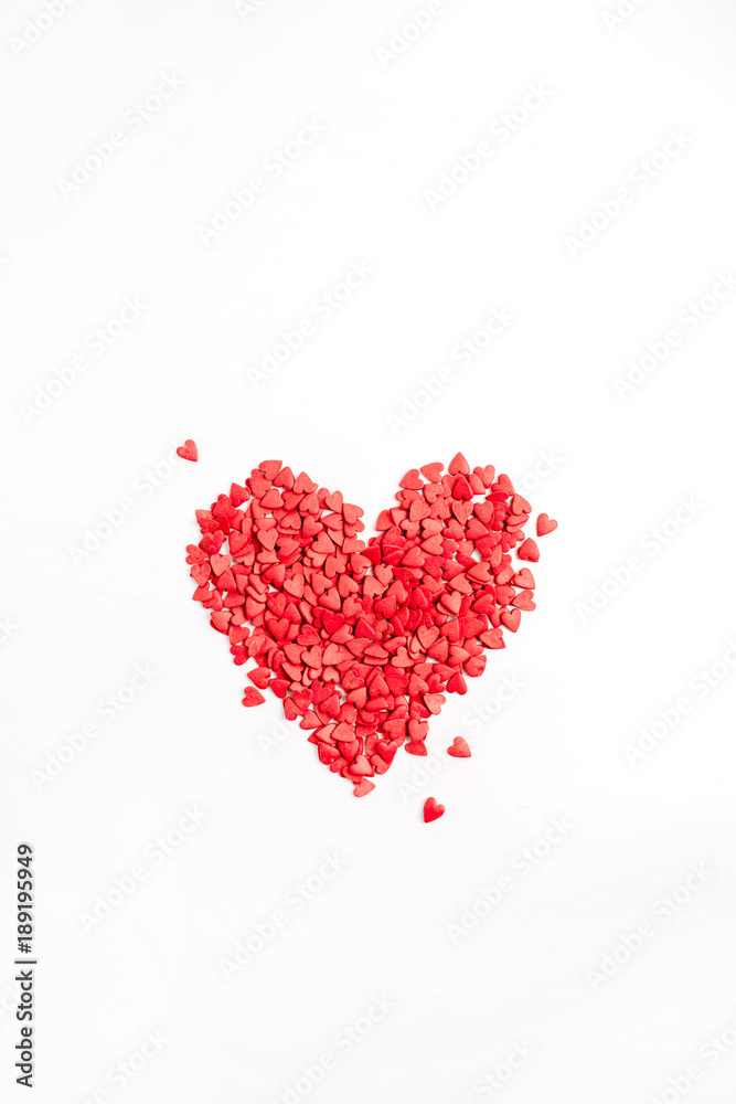 Valentine's Day composition. Red heart symbol on white background. Flat lay, top view Love concept.