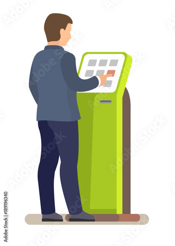 Man using electronic self service payment system.