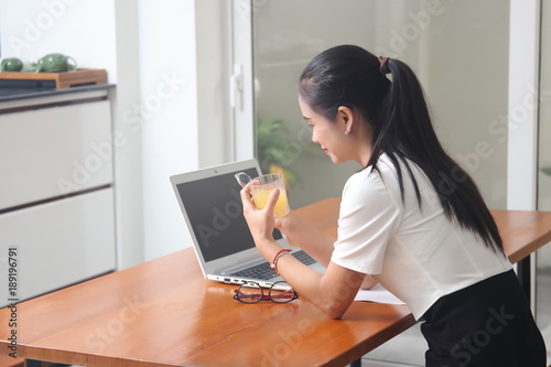 The woman using a computer