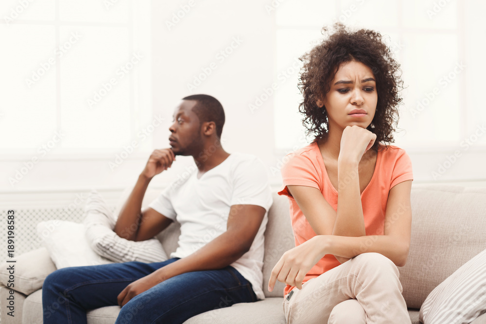 Young black couple quarreling at home Young black couple quarreling at home