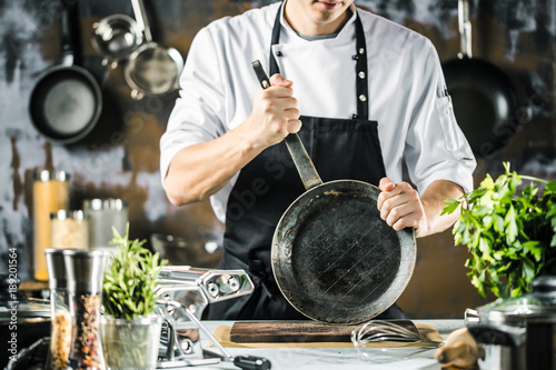 Bilde på lerret Chef Koch in der Küche