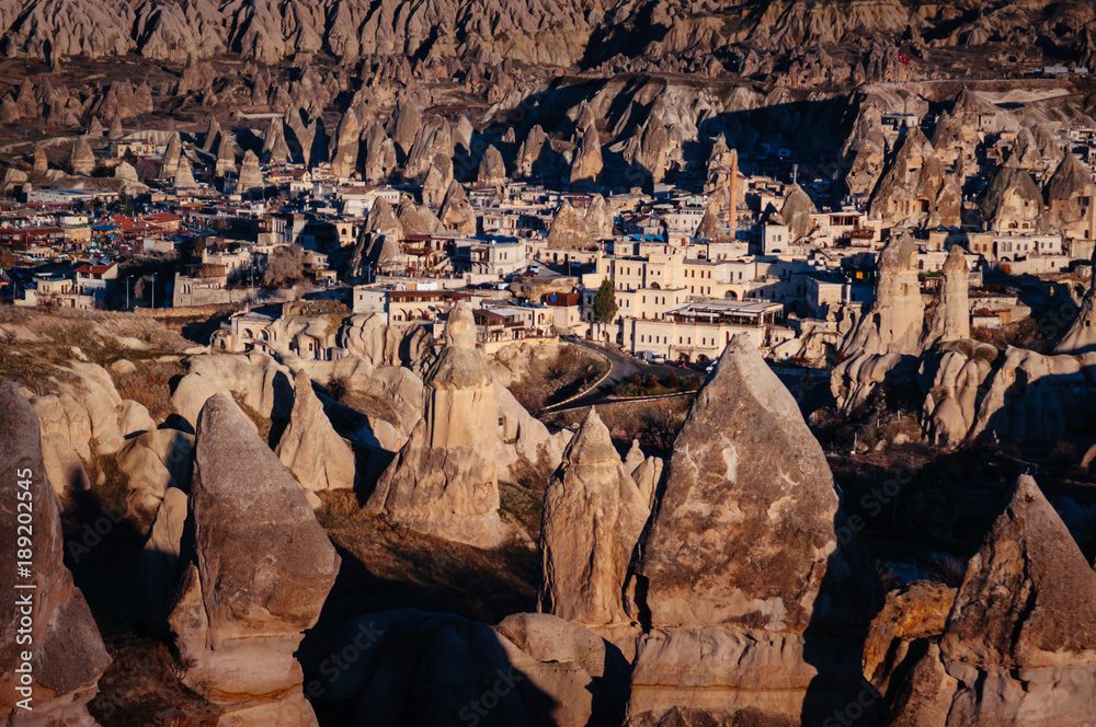  Cappadocia beautiful volcanic rock and high angle view of Goreme city, Nevsehir, Turkey