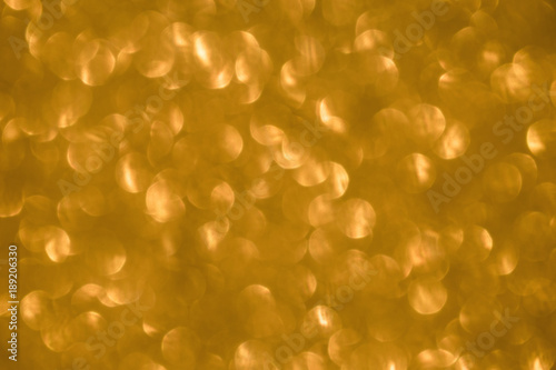 gold sparkle abstract background with bokeh lights