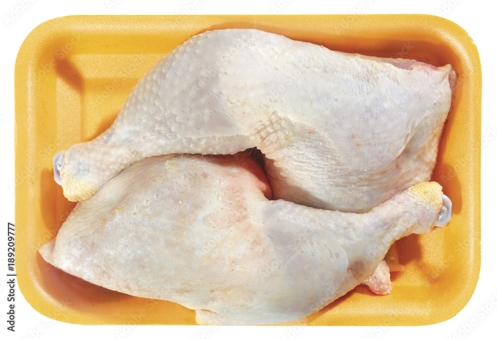 raw chicken meat in plastic tray isolated on white background raw chicken meat in plastic tray isolated on white background