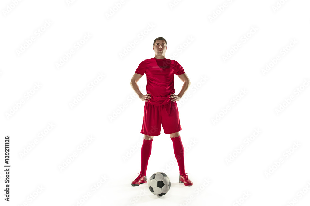 Professional football soccer player with ball isolated white background