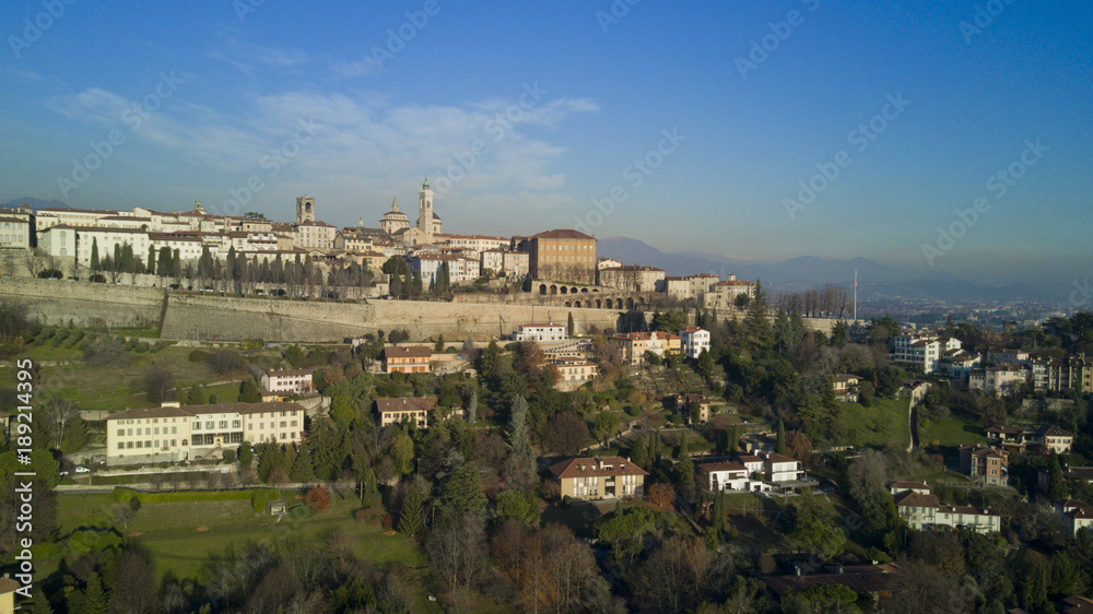 Aerial shooting with drone on Bergamo, famous and ancient Lombardia city, founded on the hills