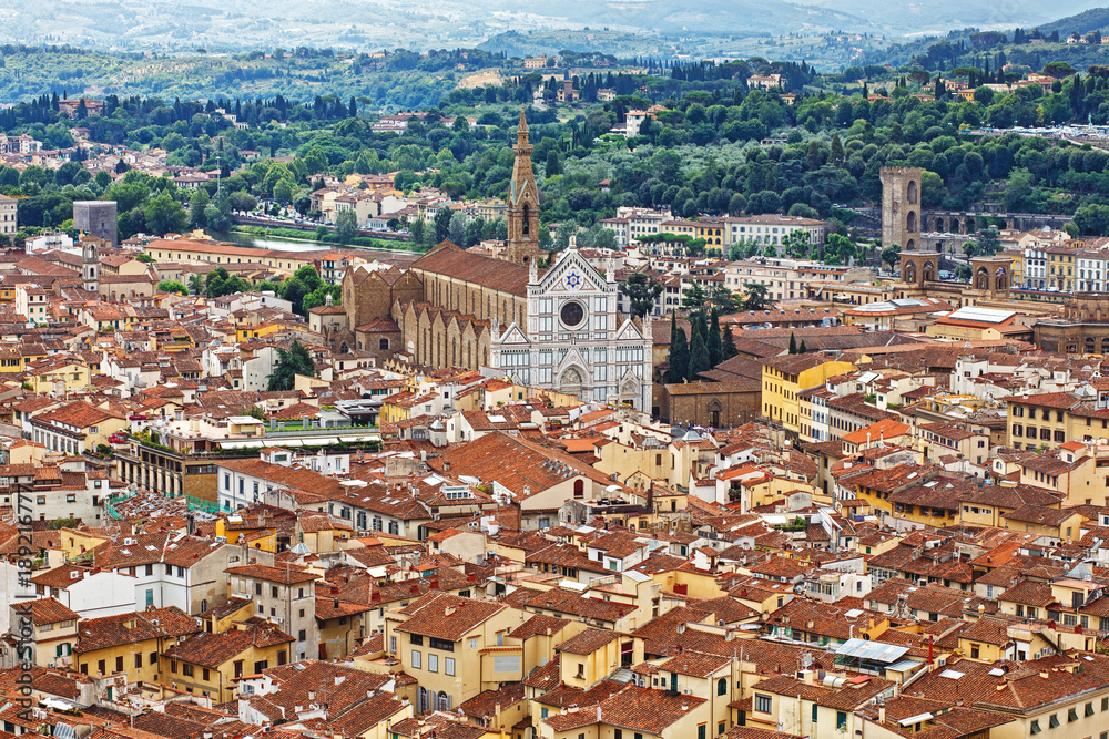 op view of Florence from the Dome of Santa Maria del Fiore. Elevated view on historical center of Florence. Panorama of medieval town on sunny summer day.