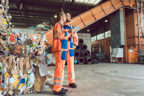 Workers in waste recycling facility
