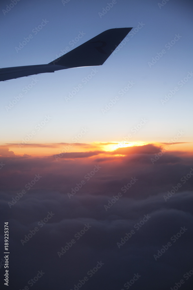 Airplane wing silhouette at sunset sky. Airplane wing silhouette at sunset sky.