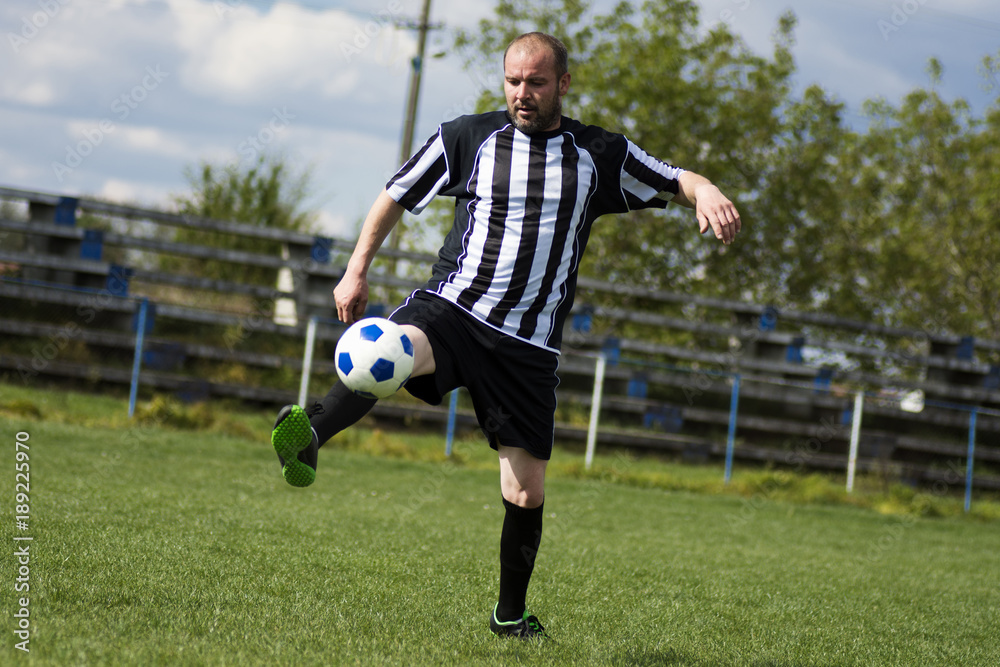 playing soccer player
