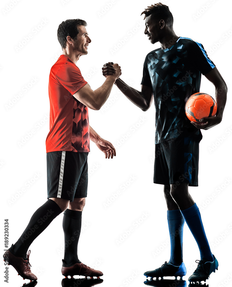 Obraz premium two soccer players men in studio silhouette isolated on white background