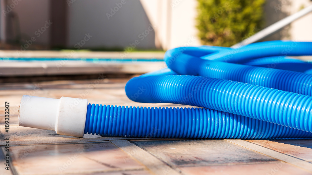 Φωτογραφία Blue plastic hose for cleaning a swimming pool, Yesulskaya, Krasnodar, Russia