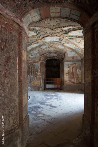 Underground room in the château of fountains lit by daylight.