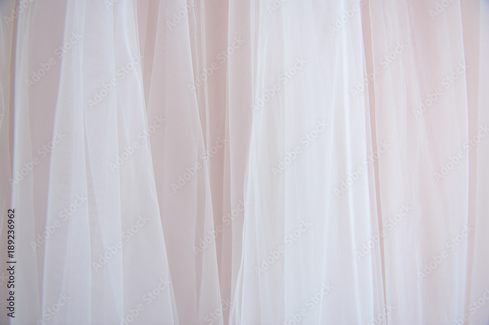 Beautiful tulle fabric on a pink bride dress