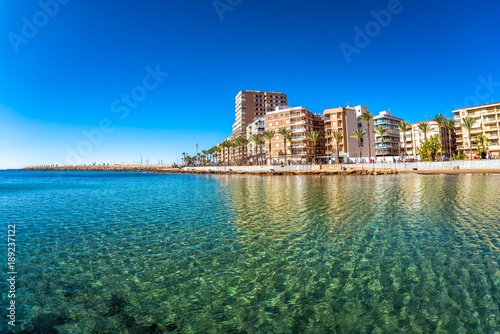 Beach and cityscape. Torrevieja, Spain photo