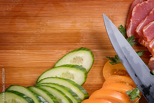 Kitchen knife, ham and vege...