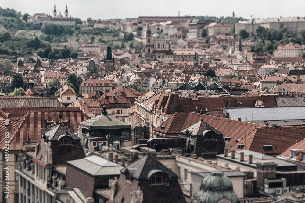 Prague cityscape with tilt-shift effect as seen from the The Old Town Hall. Prague, Czech Republic