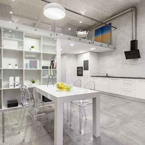 White table and transparent chairs