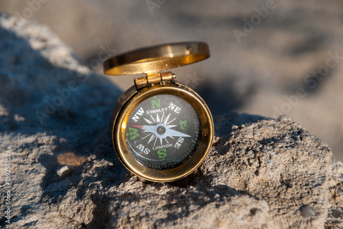 The compass on a stone photo