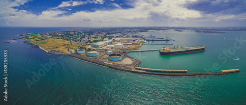 Aerial panorama of Williamstown suburb and industrial wharfs in summer. Melbourne, Australia photo