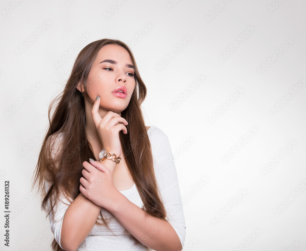 beautiful young woman with long hair wearing wrist watch beautiful young woman with long hair wearing wrist watch
