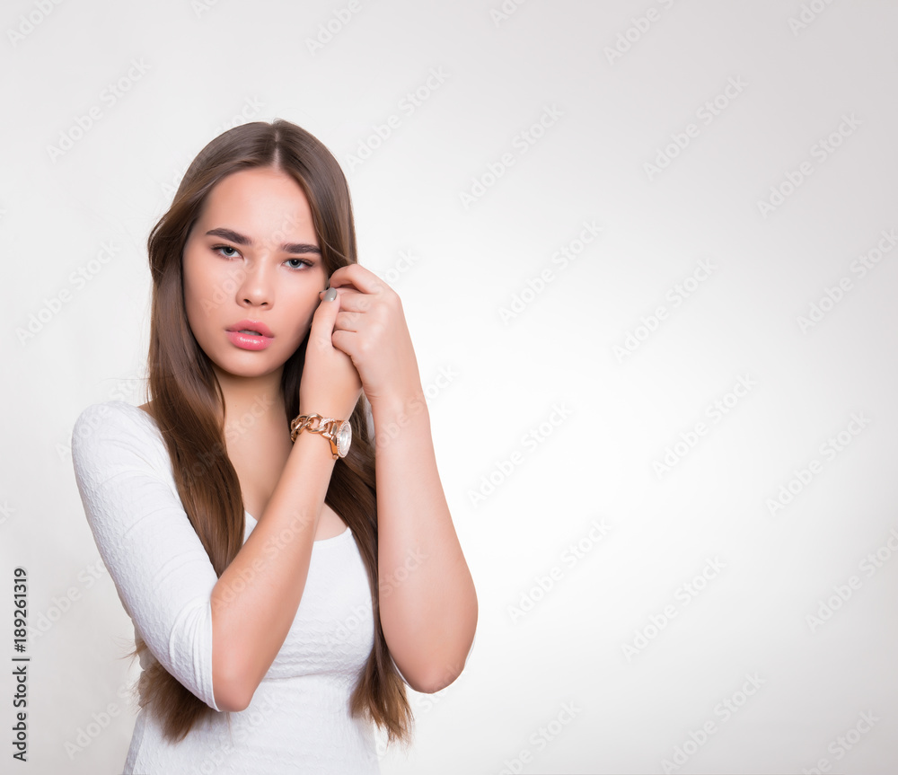 beautiful young woman with long hair wearing wrist watch beautiful young woman with long hair wearing wrist watch
