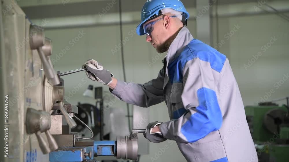 Metal Lathe Machine in Use. Lathe Operator in Action. 4K Footage with Slight Motion. Metalworking Theme. Metal Lathe Machine in Use. Lathe Operator in Action. 4K Footage with Slight Motion. Metalworking Theme.