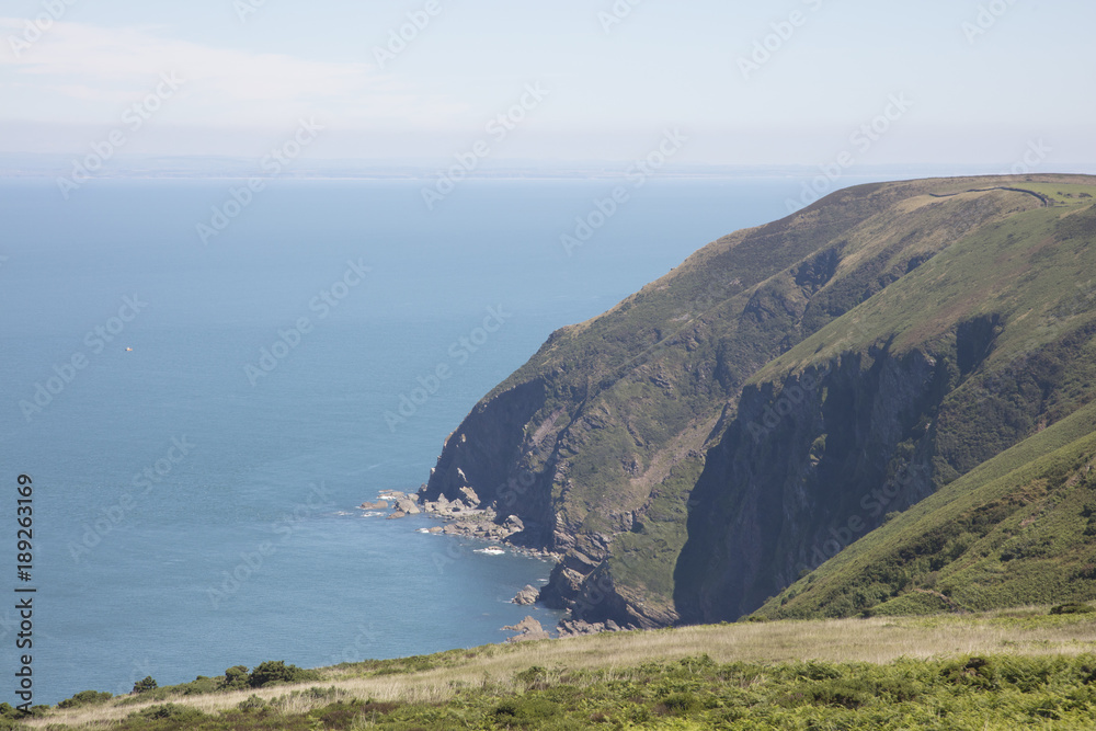 Steep cliffs leading to the sea in North Devon England