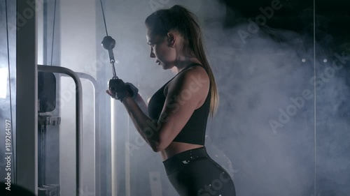 Effective training girl in fitness club photo