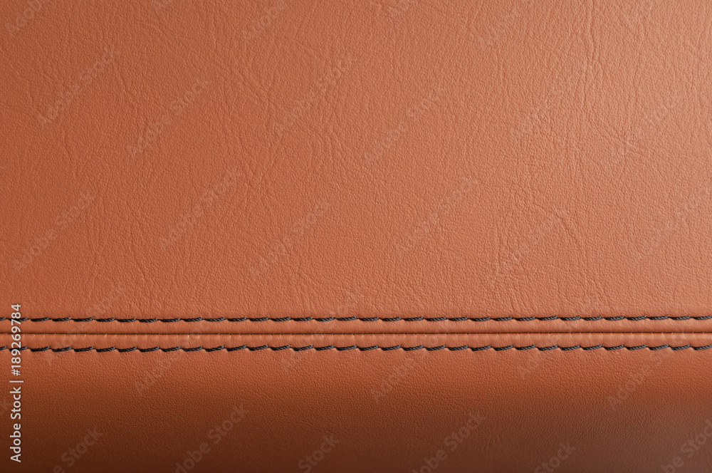 Fototapeta premium Car interior detail. Leather background with stich.