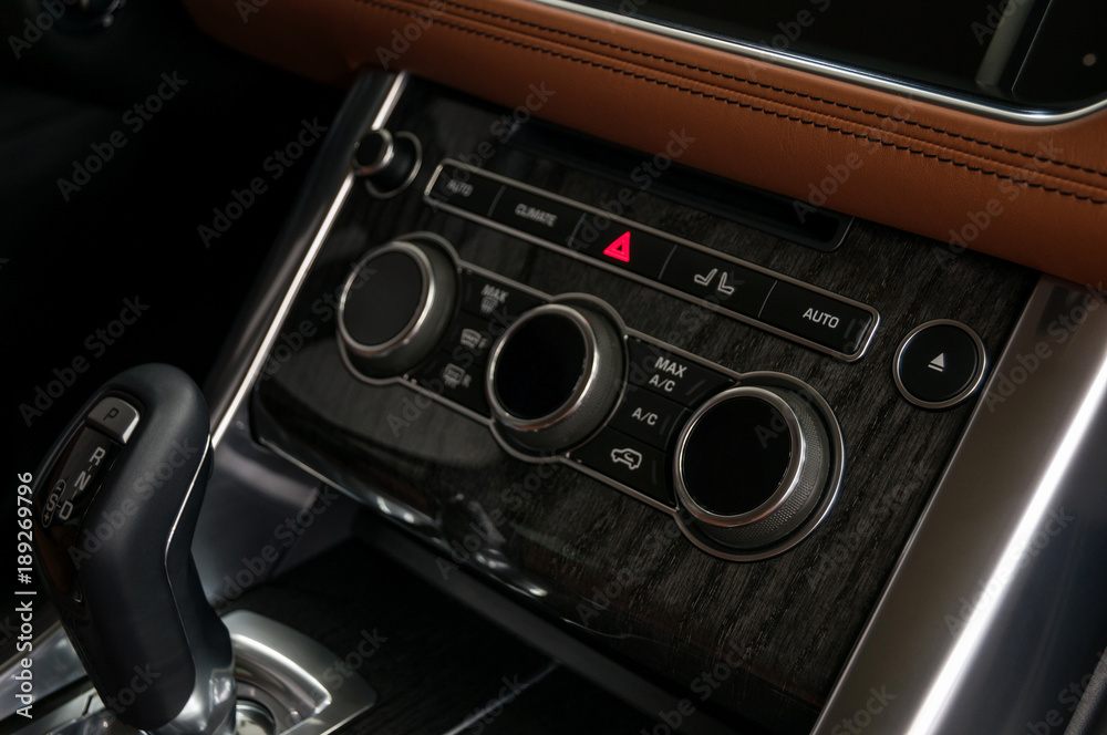 Fototapeta premium Modern car dashboard. Control buttons. Interior detail.