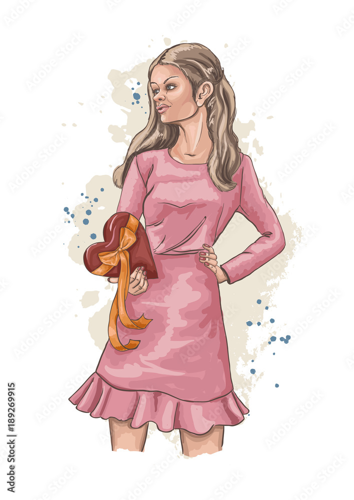 Beautiful girl in a stylish dress holds 