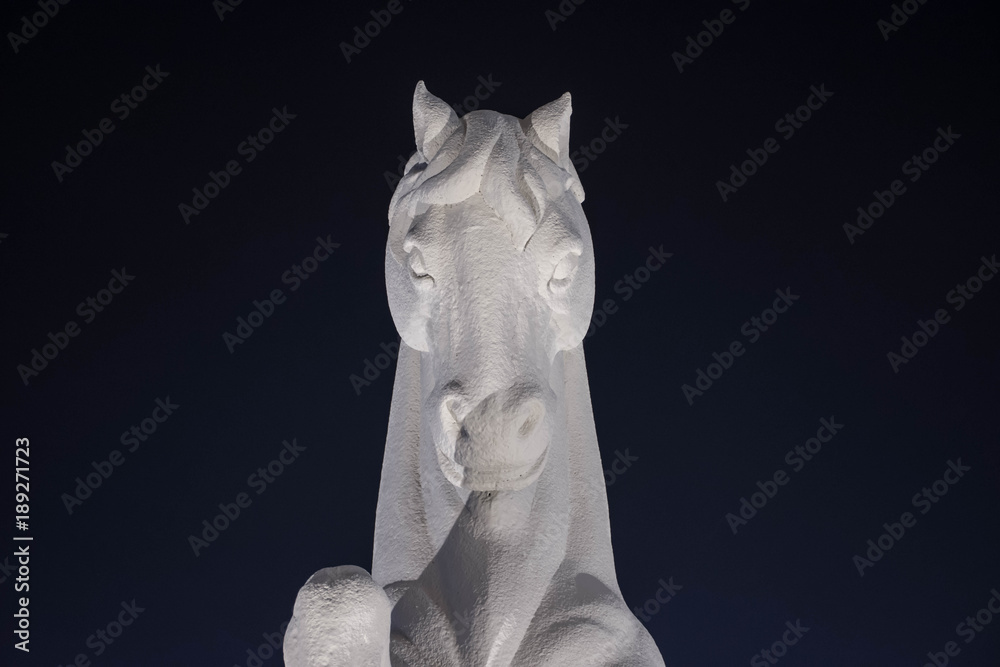 Fototapeta premium A horse head statue isolated on white background.