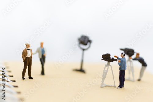 Miniature people : Small team of tv reporter with Celebrity Interviews, production television concept.